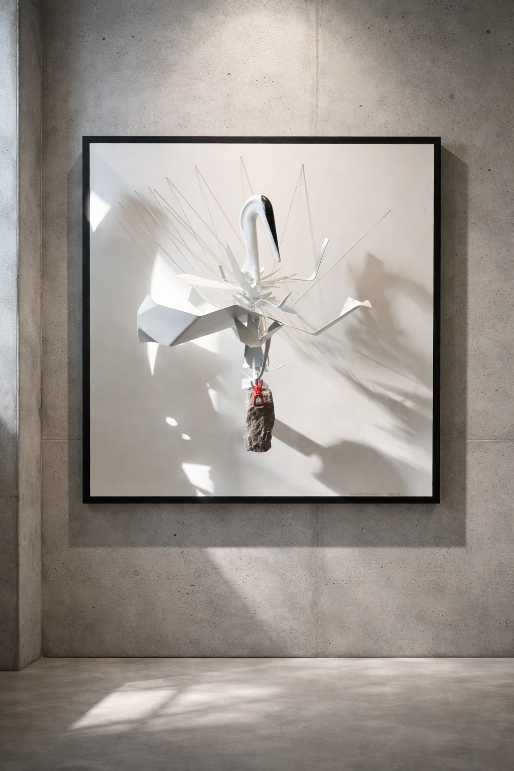White sculptural artwork by Peter Sprengers with a suspended stone